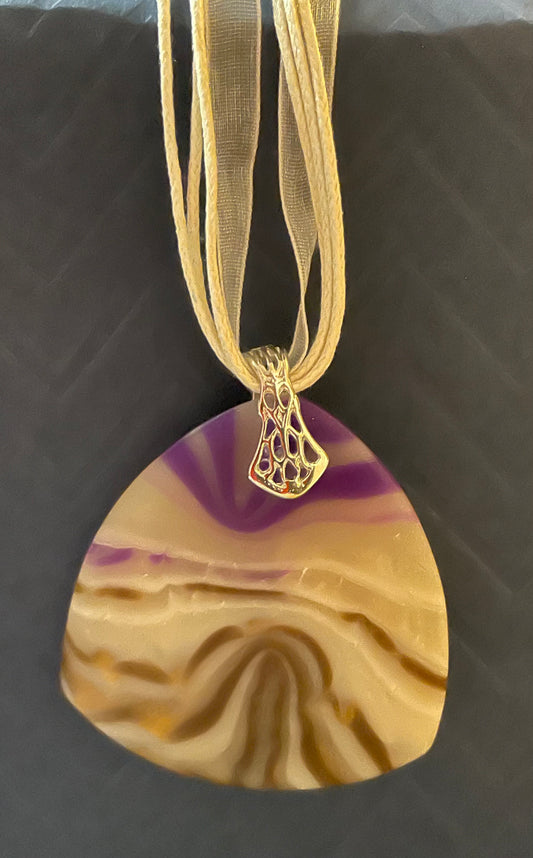 Purple translucent and silver pendant