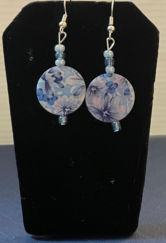Swirling flowers in blue earrings