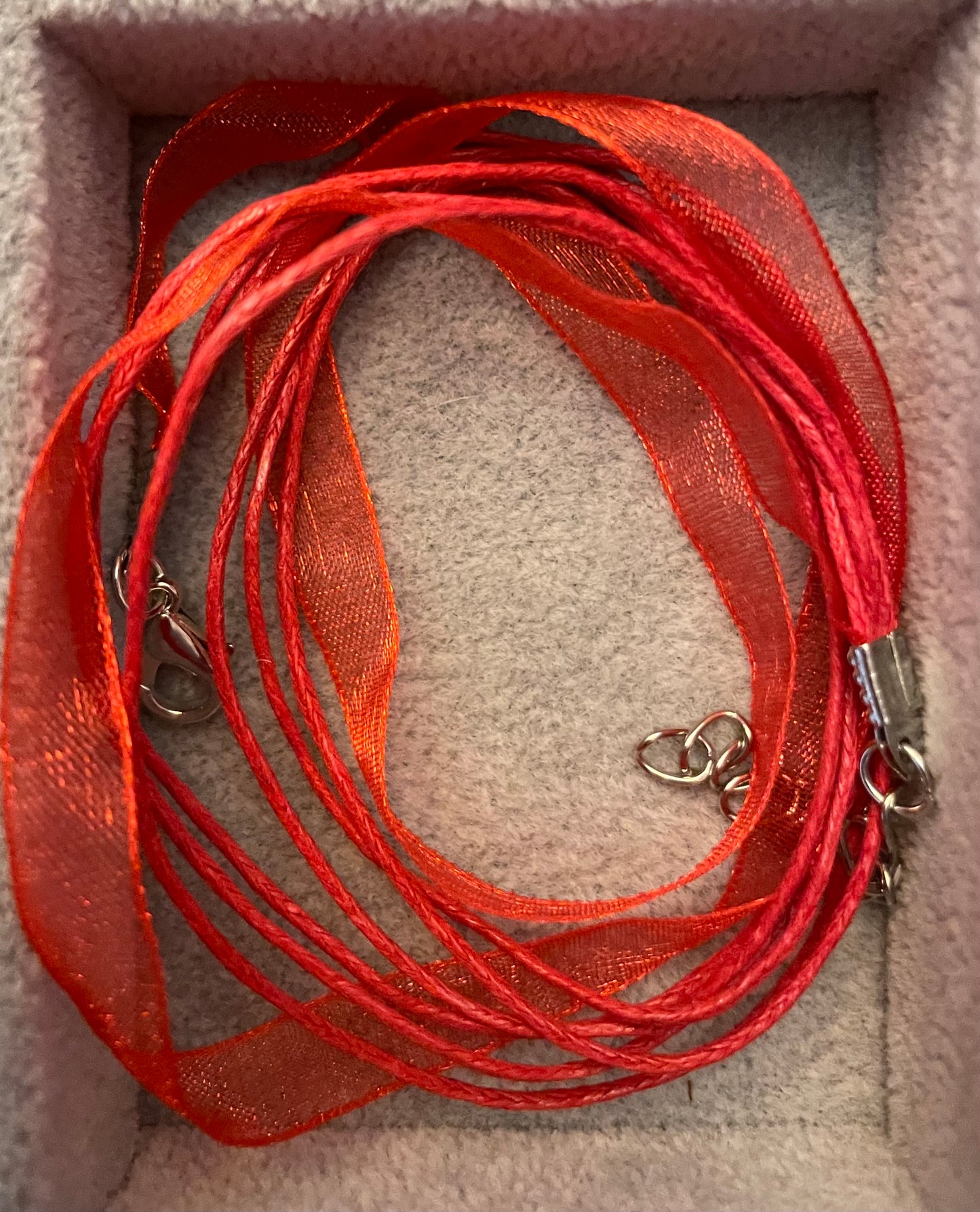 Organza and cord necklaces with silver tone lobster claw clasps