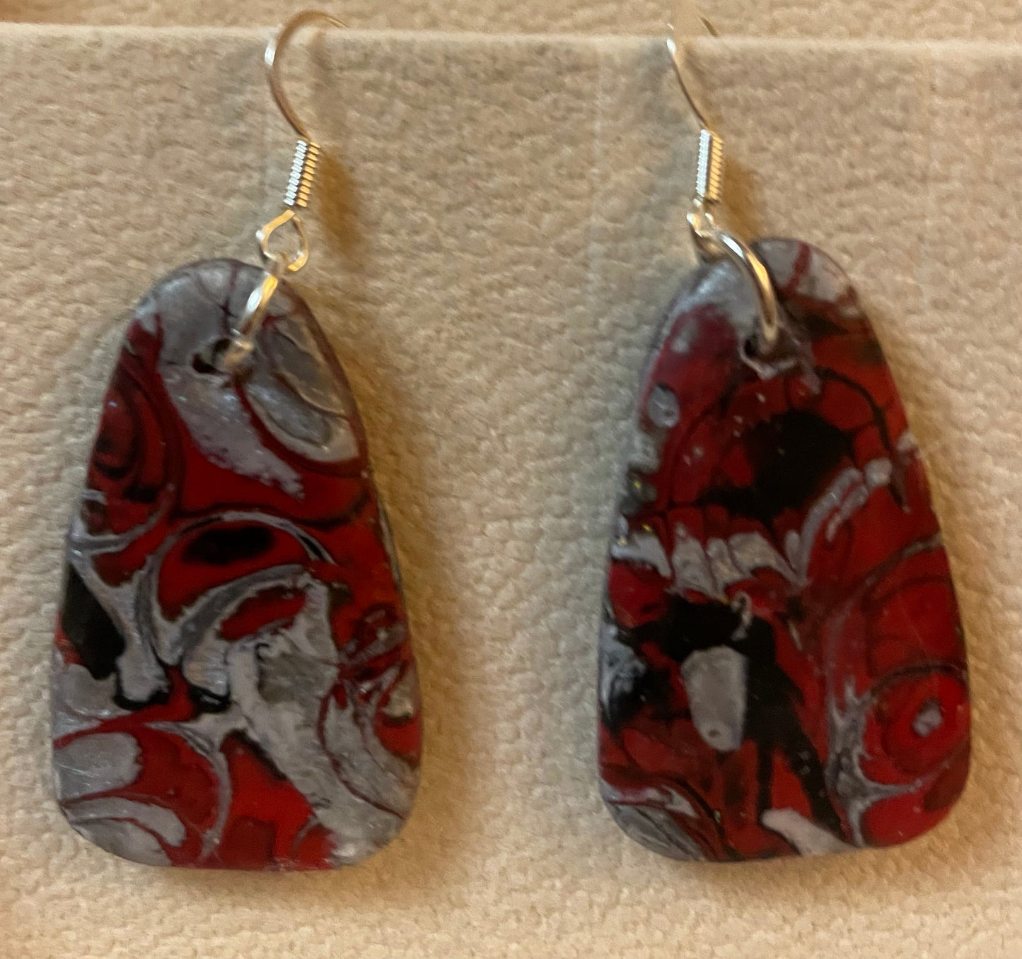 Red and silver triangular earrings