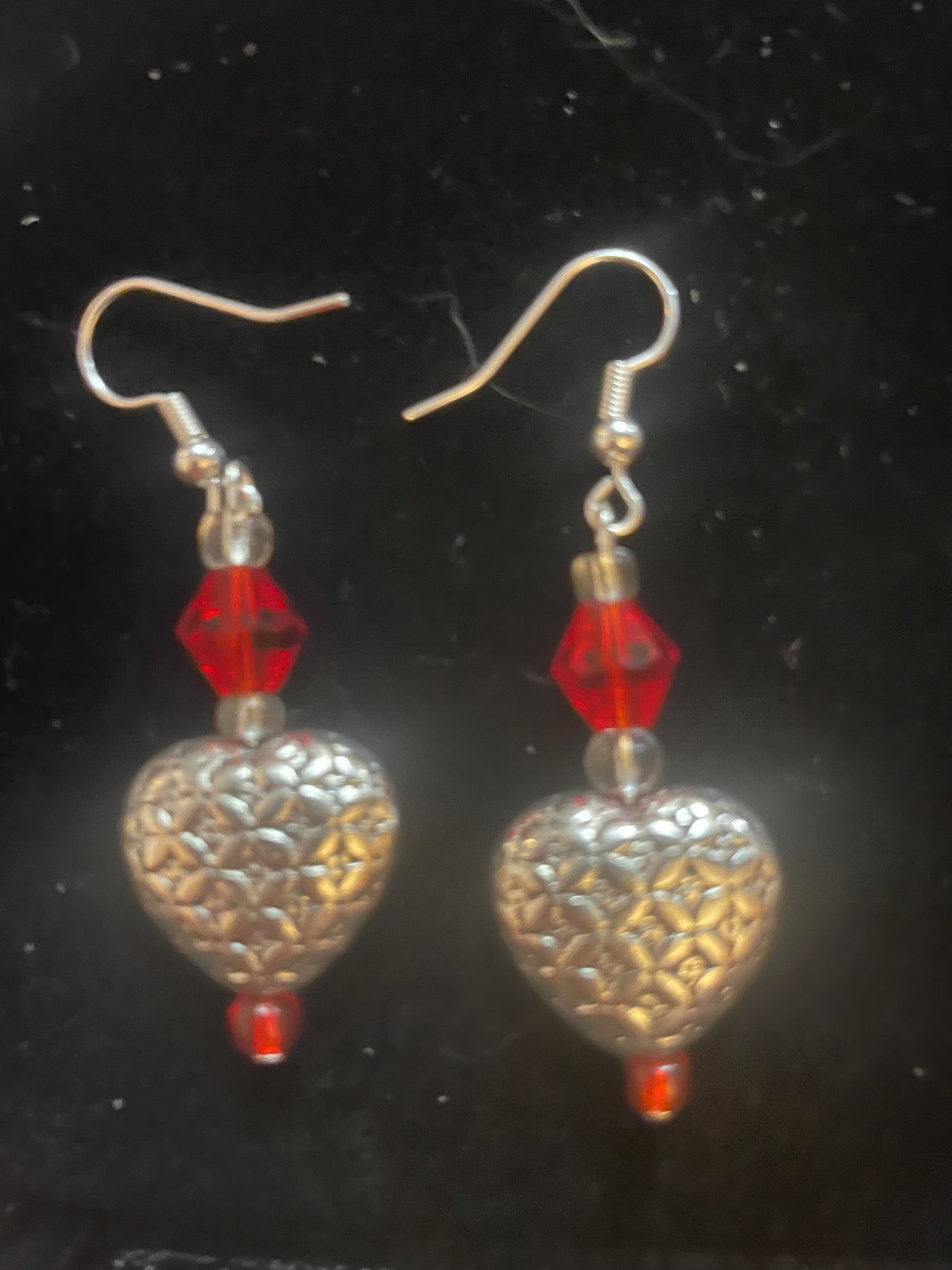 Small silver toned heart earrings