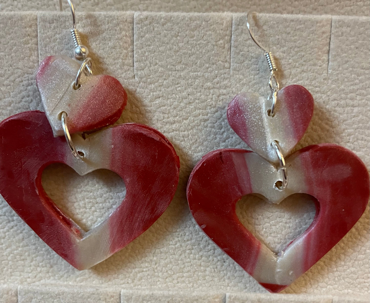 Shimmery pearlescent double heart earrings