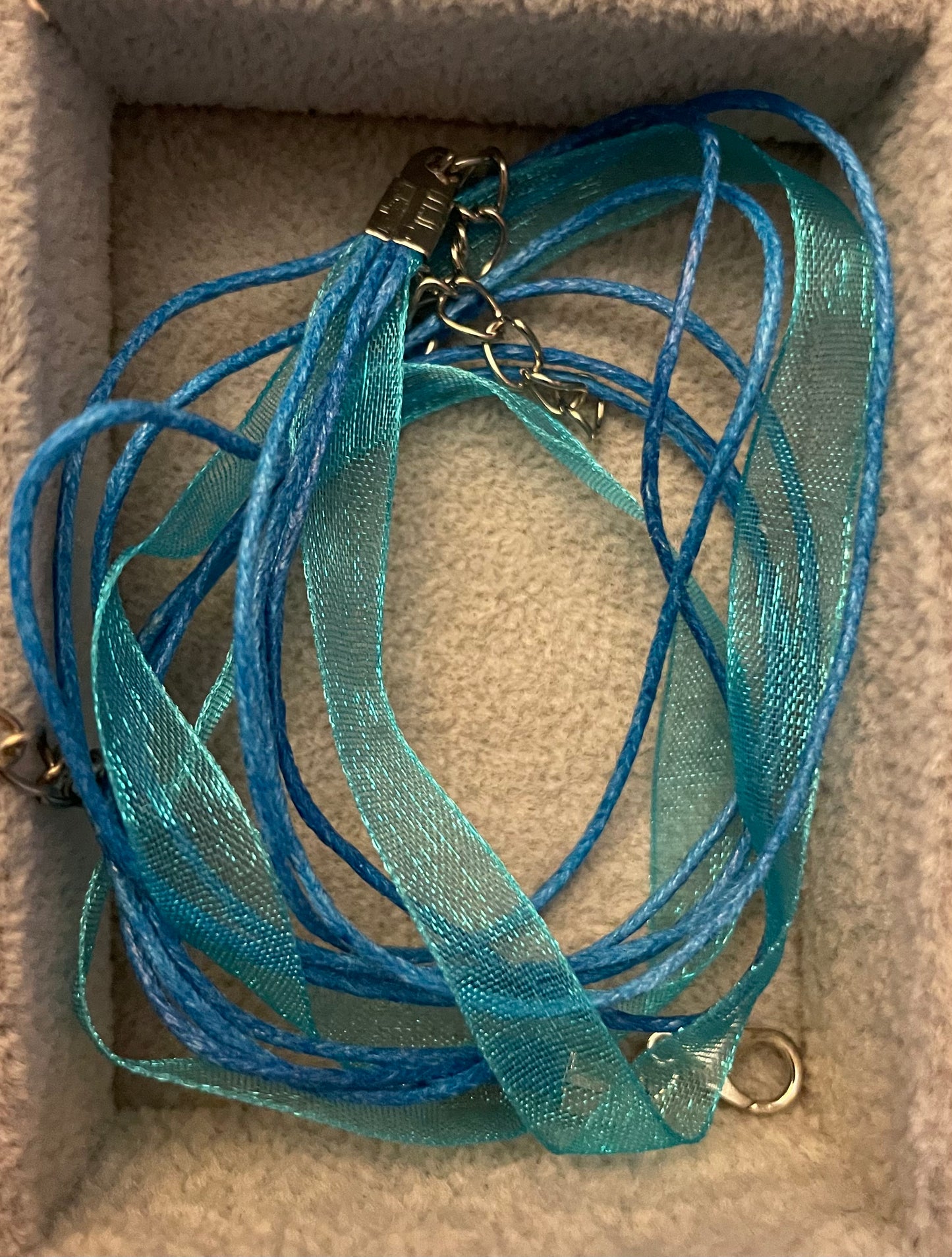 Organza and cord necklaces with silver tone lobster claw clasps